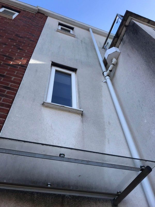 7 front of building in need of washing and treatment